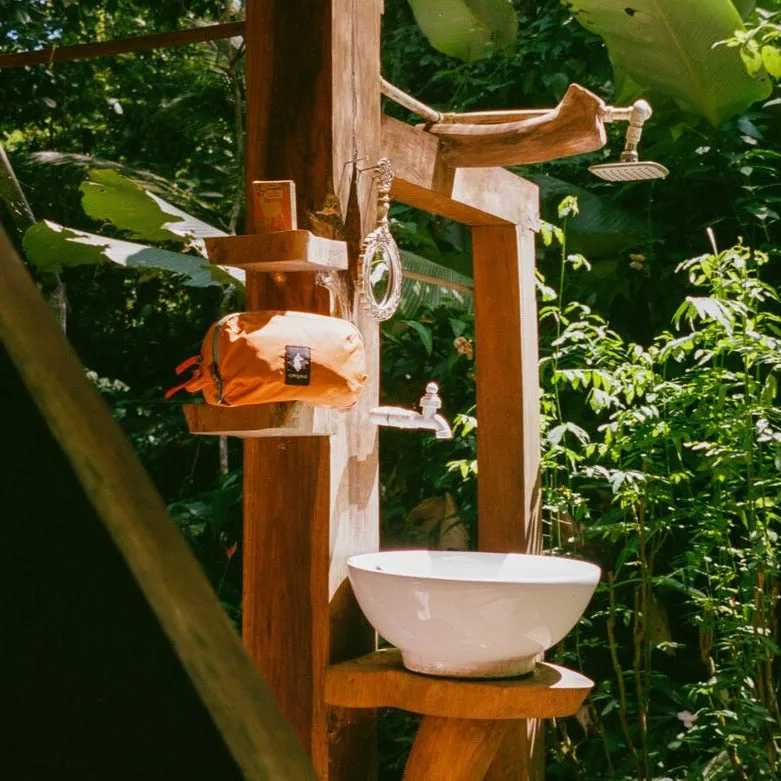 Cotopaxi Nido trousse de toilette Bronze 4L recyclée