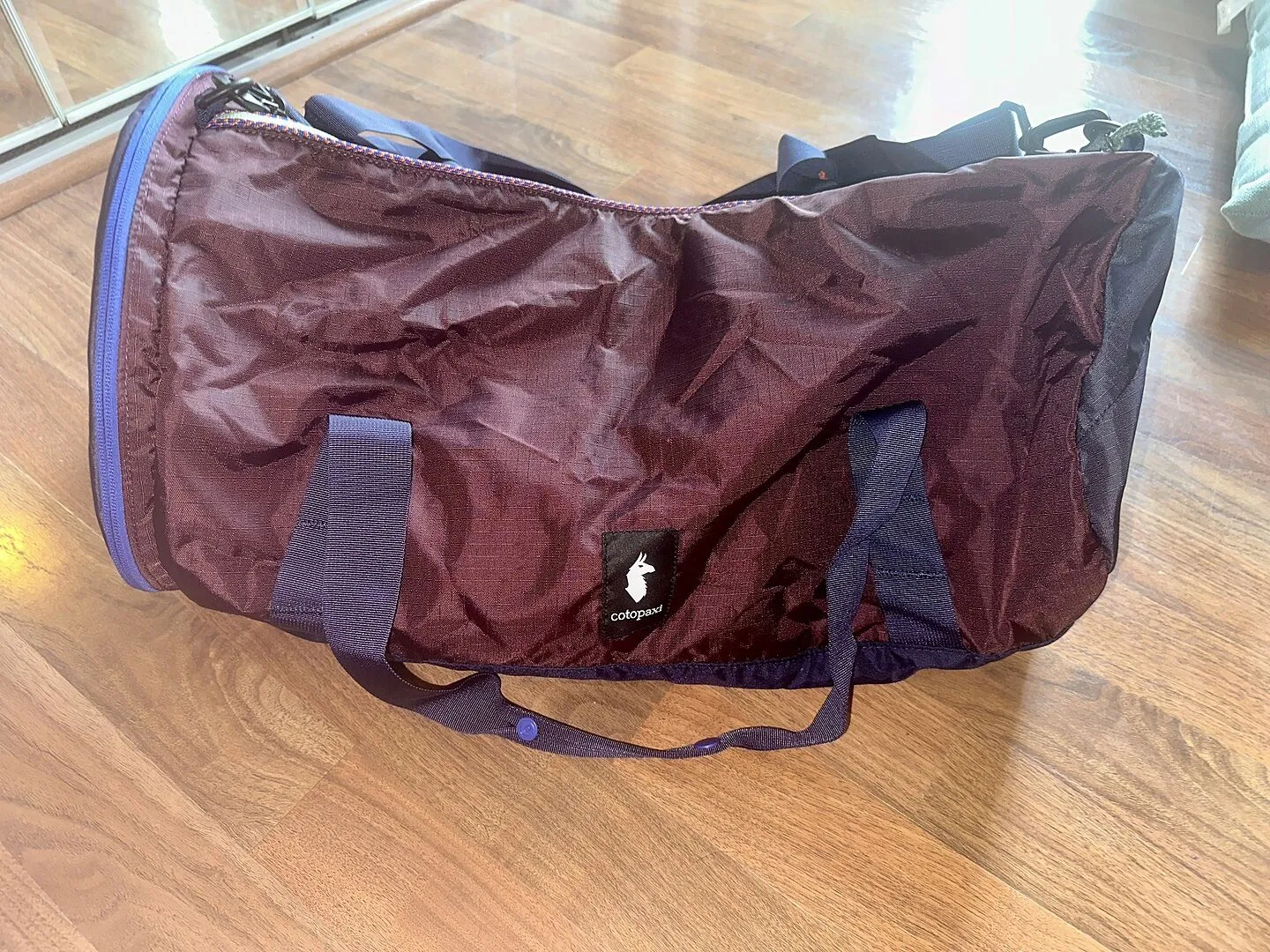 Cotopaxi Ligera 45L Cada Día sac voyage Amber léger