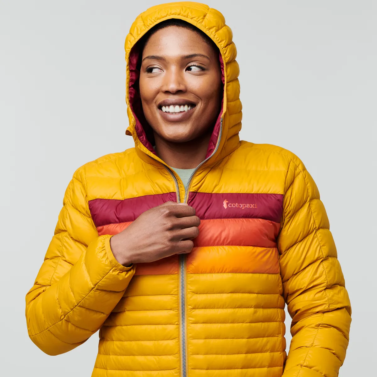 Cotopaxi Fuego Hooded Down Jacket doudoune femme Amber Stripes