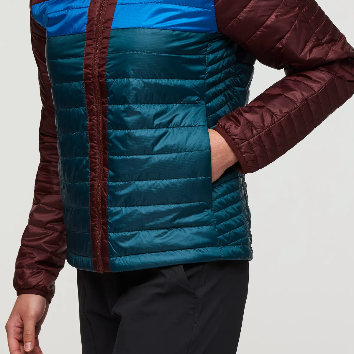 Cotopaxi Capa veste à capuche matelassée femme