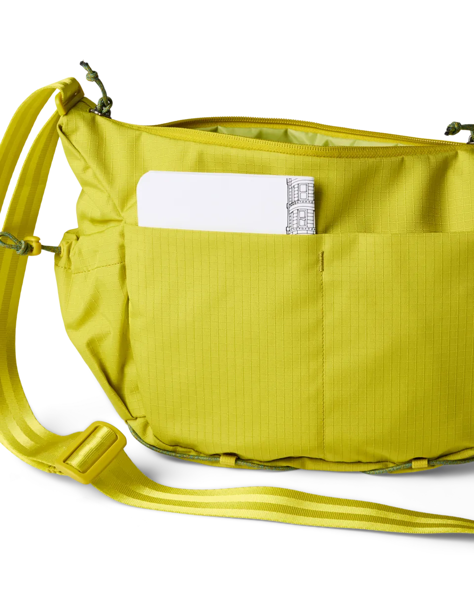 Cotopaxi Viaje sac bandoulière 9L poches gourde
