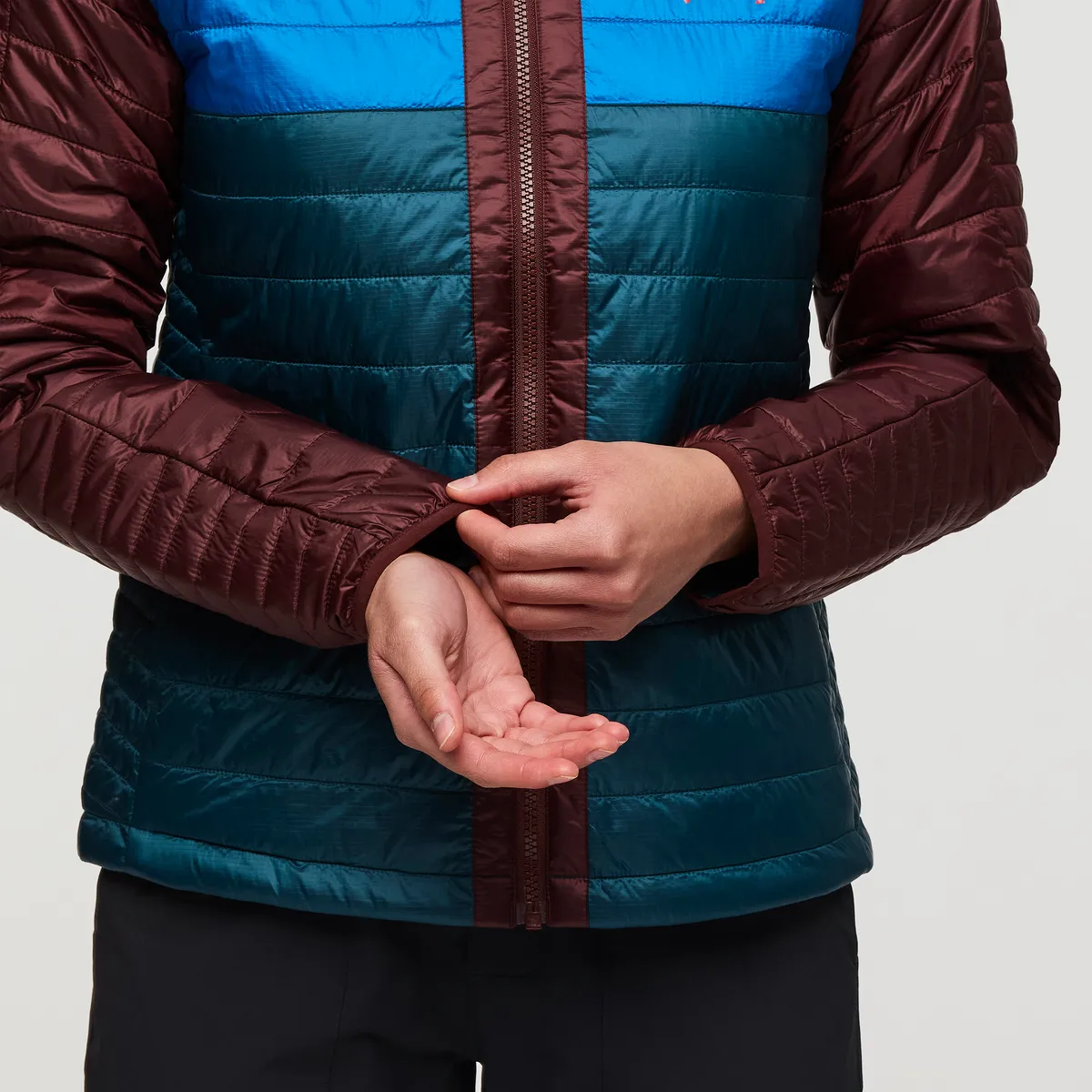 Cotopaxi Capa veste à capuche matelassée femme