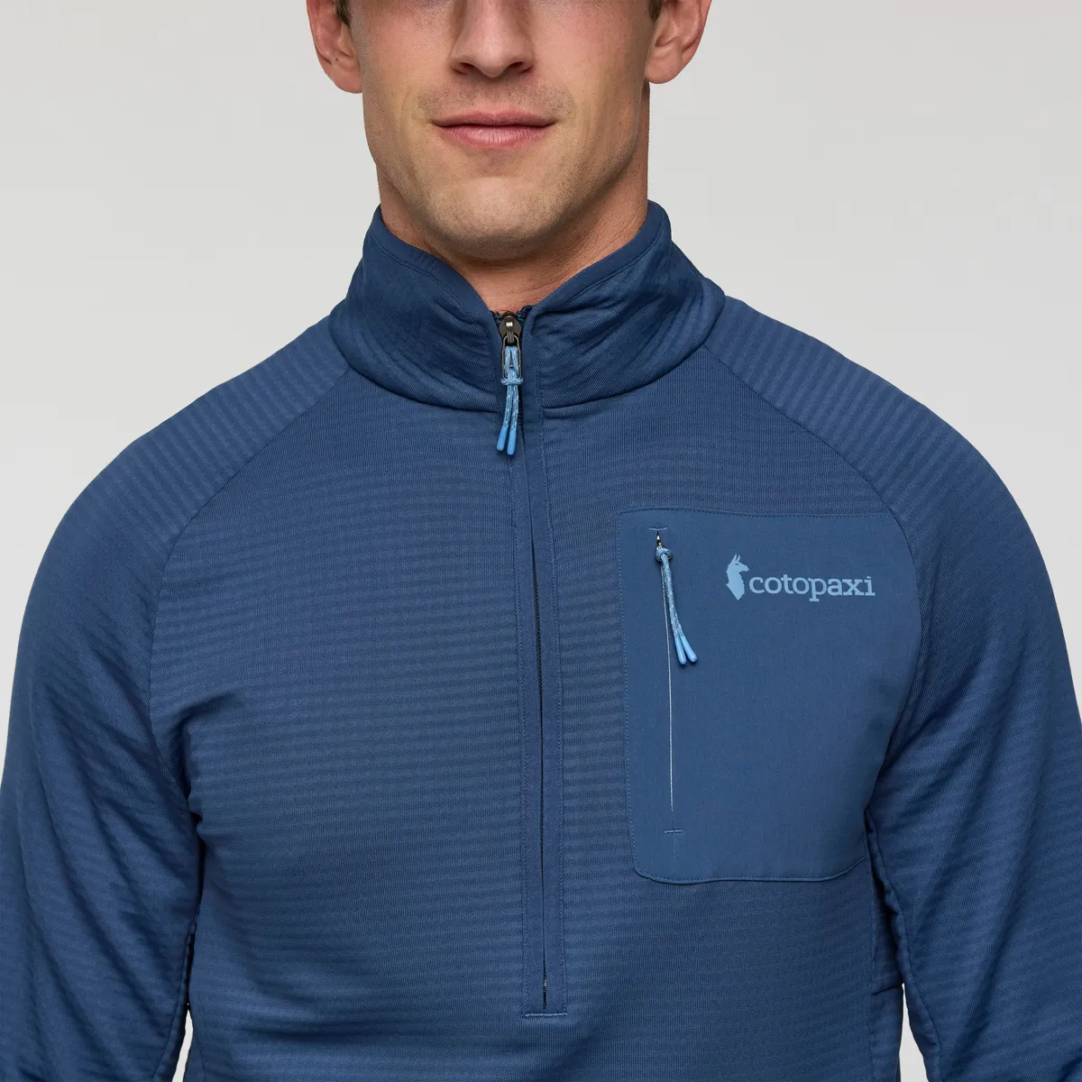 Cotopaxi Otero polaire homme Deep Sea demi-zip