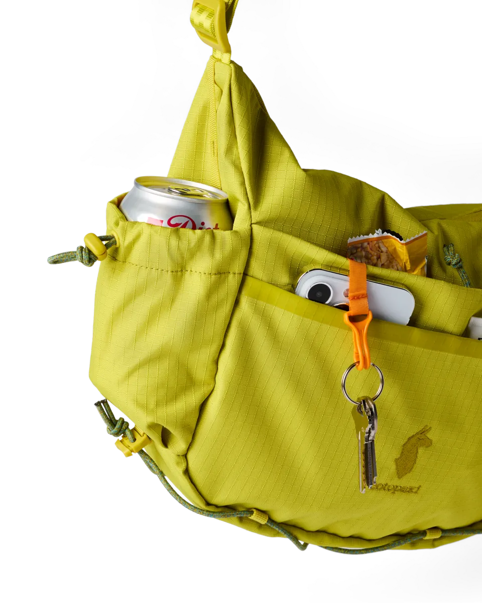 Cotopaxi Viaje sac bandoulière 9L poches gourde
