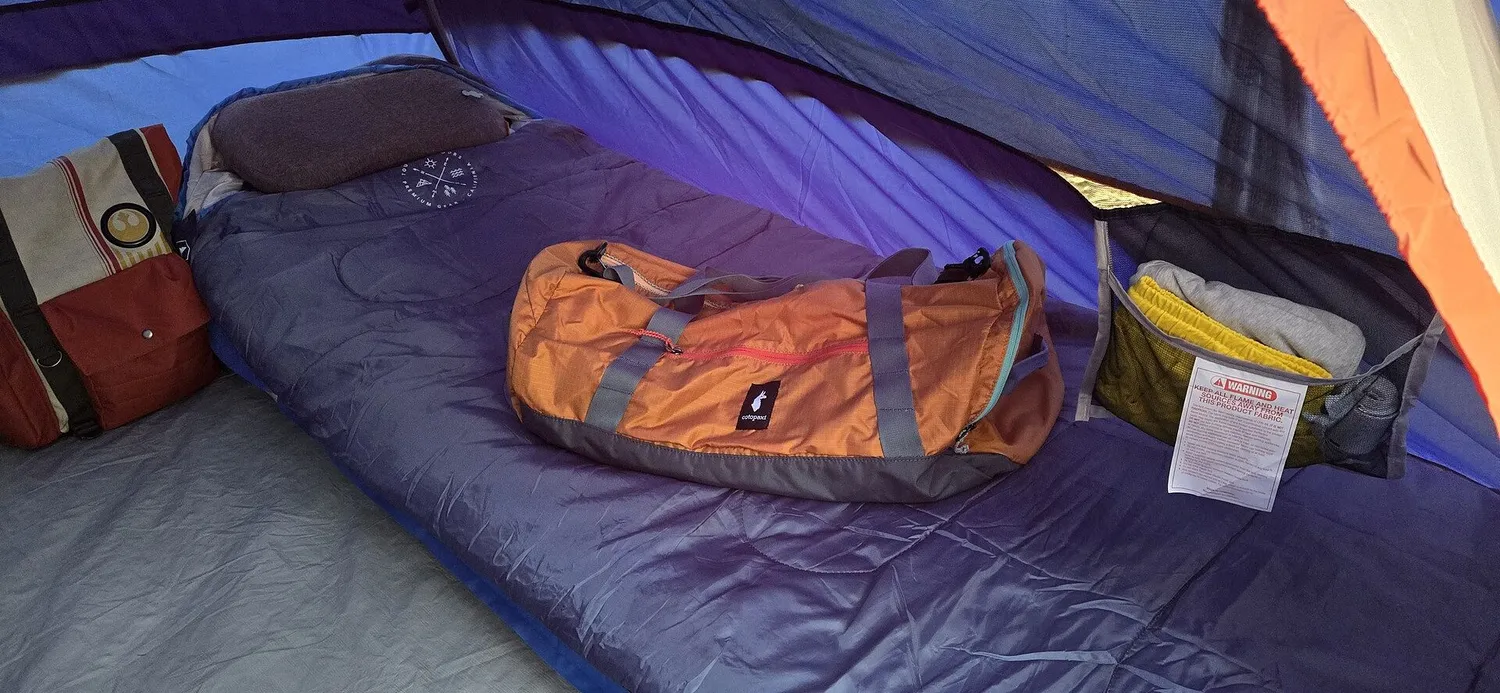Cotopaxi Ligera 45L sac de voyage Tamarindo pliable