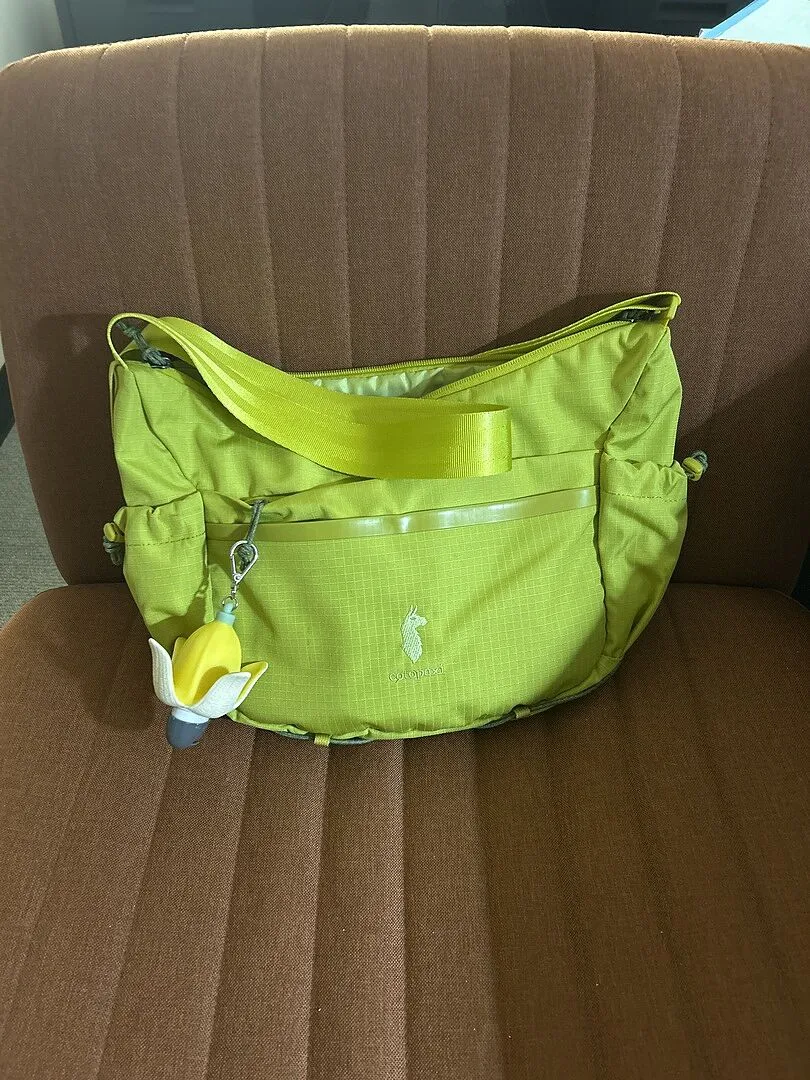 Cotopaxi Viaje sac bandoulière 9L poches gourde