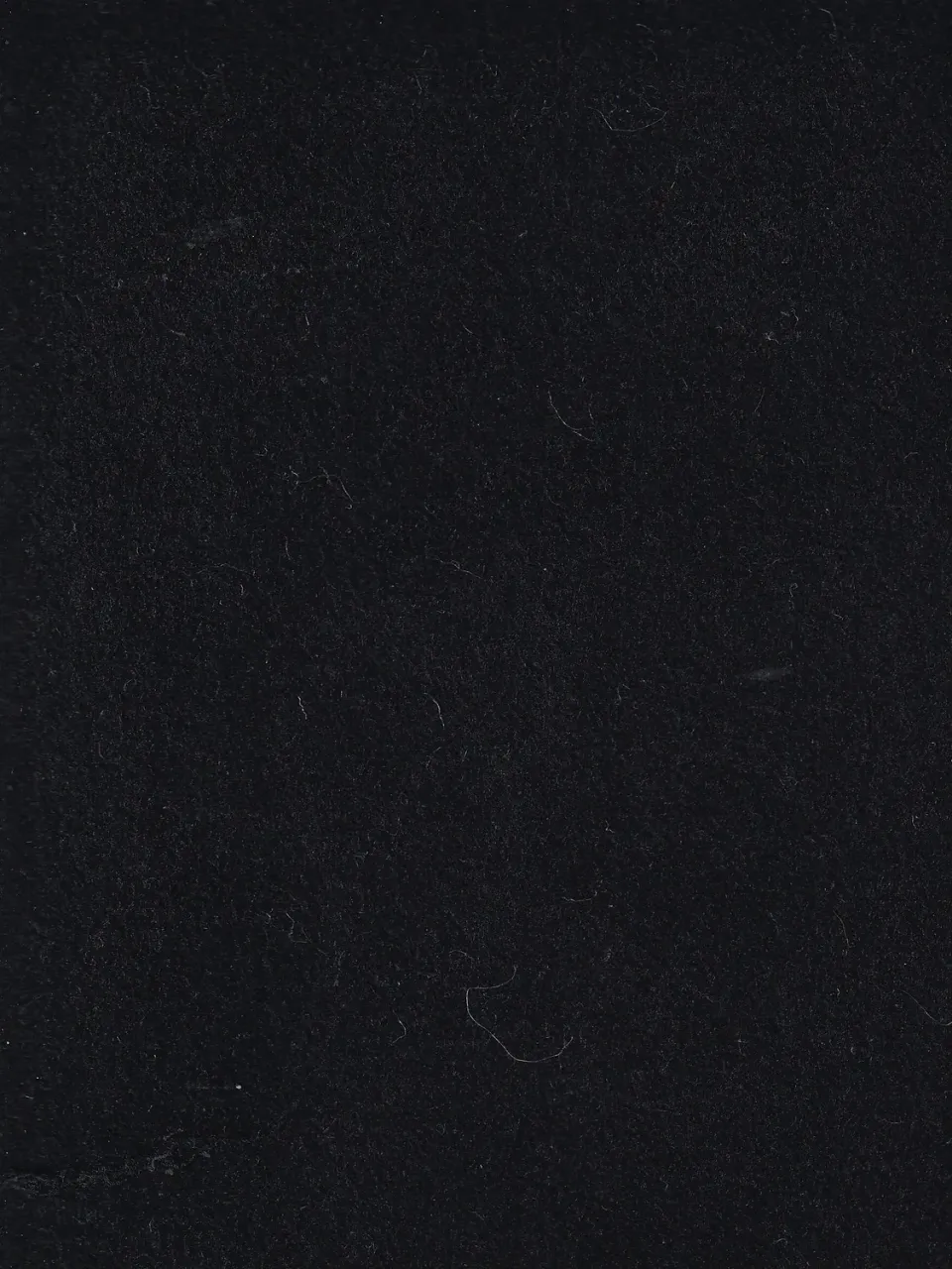 Hollington tissu peau de pêche noir au mètre