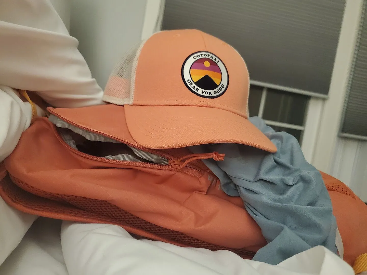 Cotopaxi Sunny Side casquette trucker Amber respirante