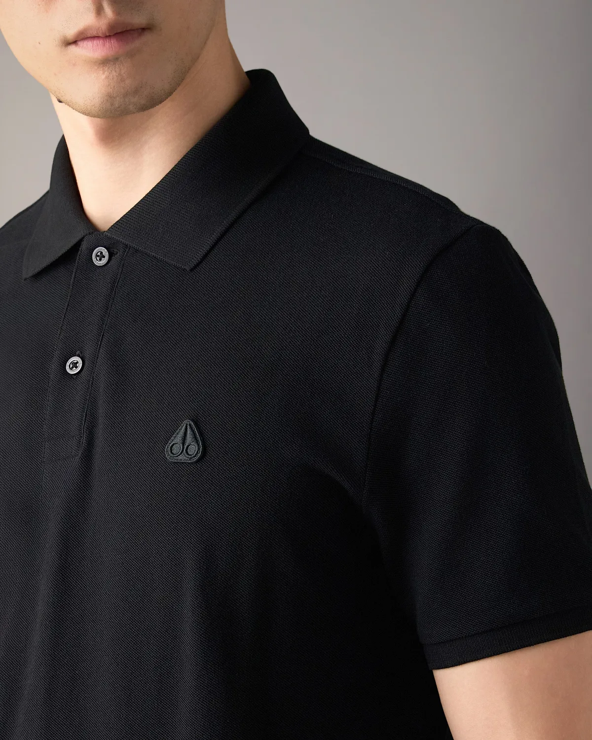 Moose Knuckles Yul polo noir coton stretch
