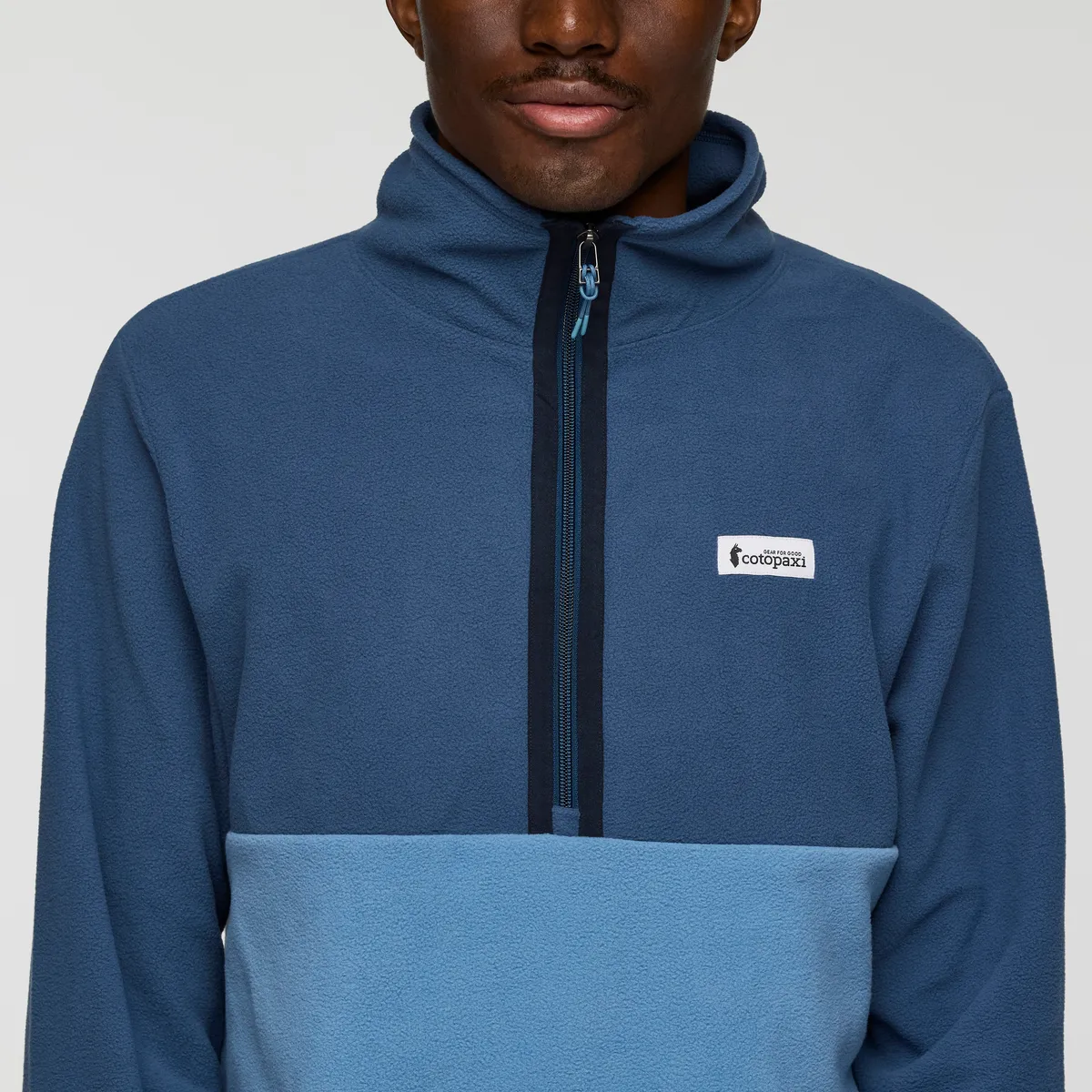 Cotopaxi Amado pull polaire homme Deep Sea/Fjord demi-zip