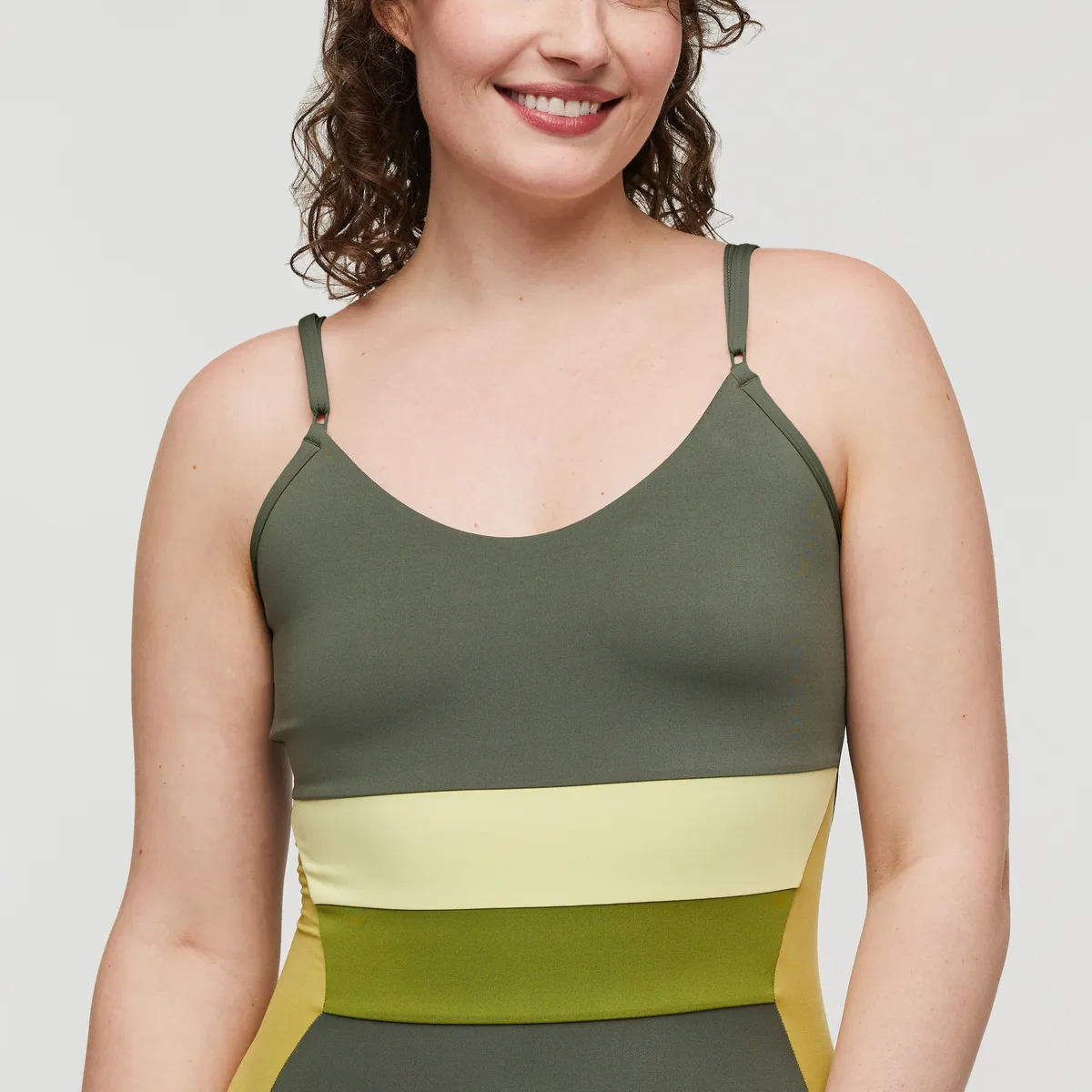 Cotopaxi Muevo bodysuit femme sport recyclé