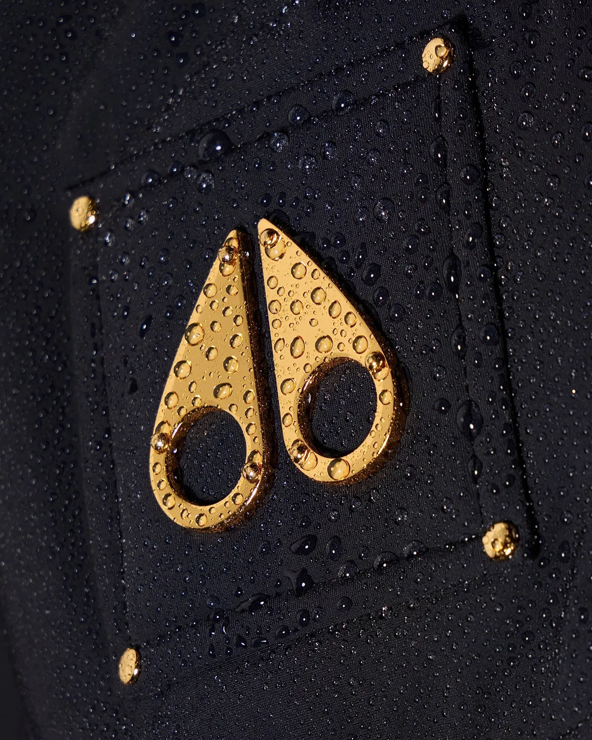 Moose Knuckles Gilded parka longue noire ceinture dorée
